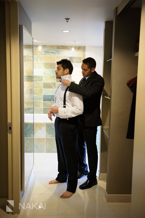 south asian groom getting ready wedding