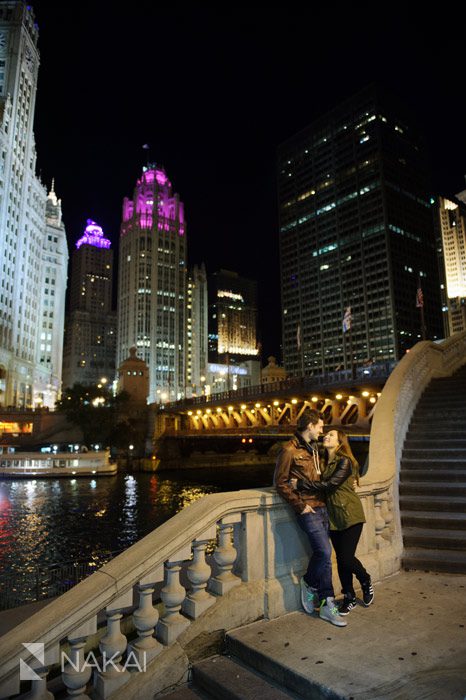chicago river engagement photo at night bridge wrigley building