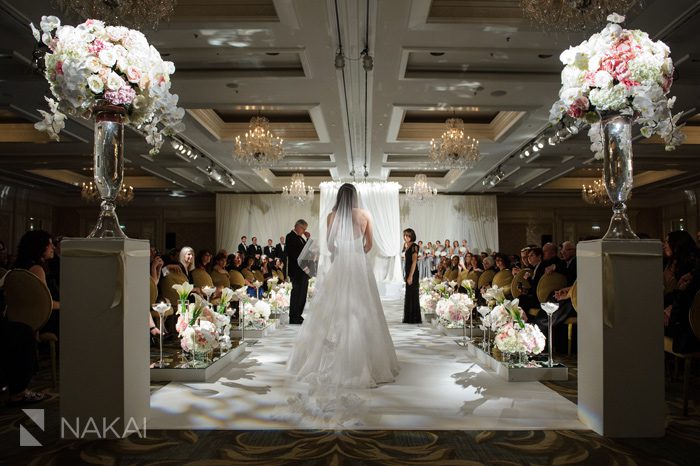 chicago four seasons wedding photo bride walking down the aisle