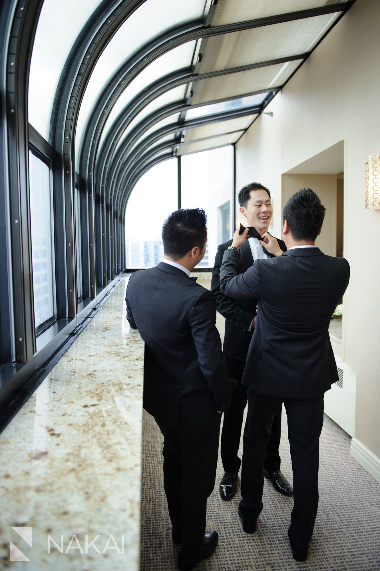 tower suite groom intercontinental magnificent mile wedding photo chicago