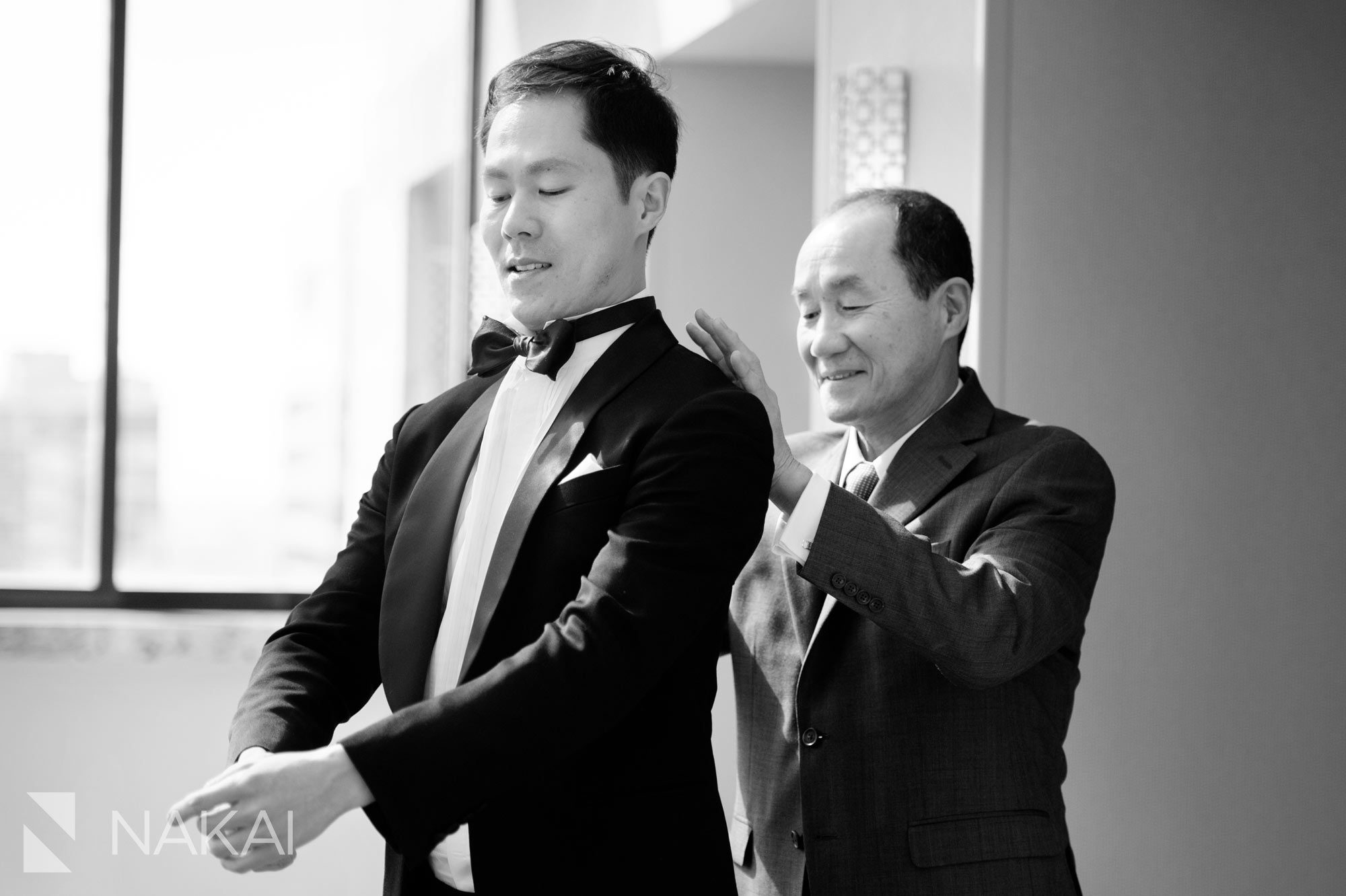 tower suite groom intercon magnificent mile wedding photo chicago