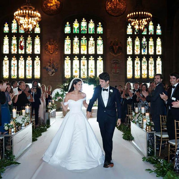University Club of Chicago wedding ceremony photo, bride and groom exiting down the aisle