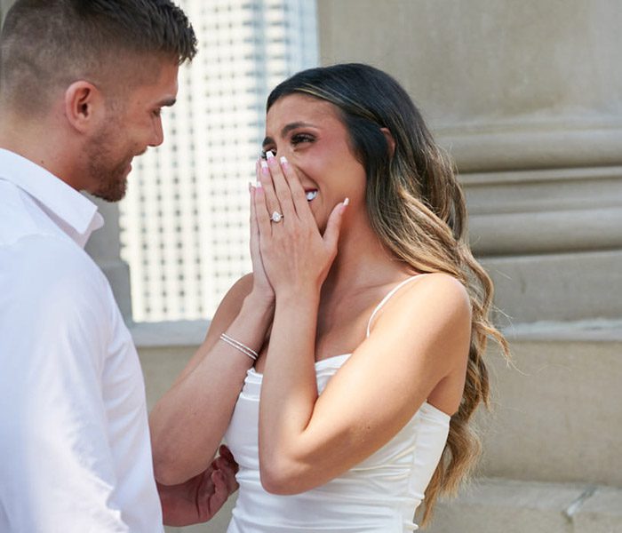 londonhouse proposal photographer in Chicago. Smiling with emotions, ring on her hand