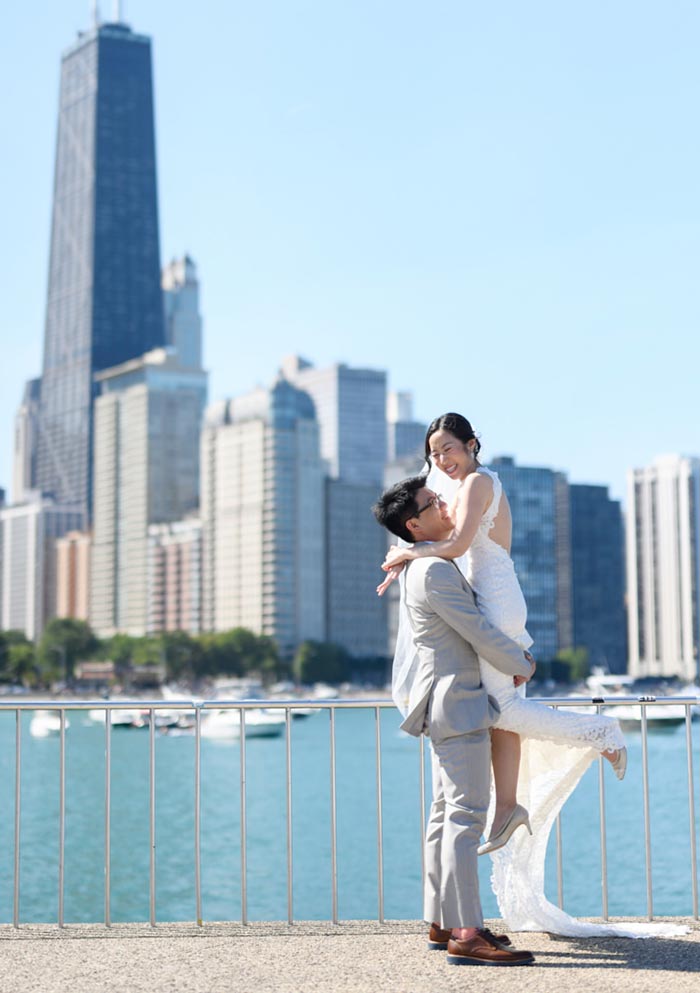 olive park wedding photo bride & groom w/ Chicago skyline in background