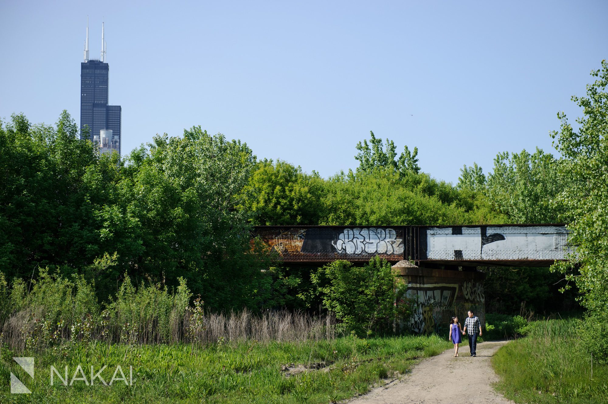 artistic chicago engagement photographer skyline