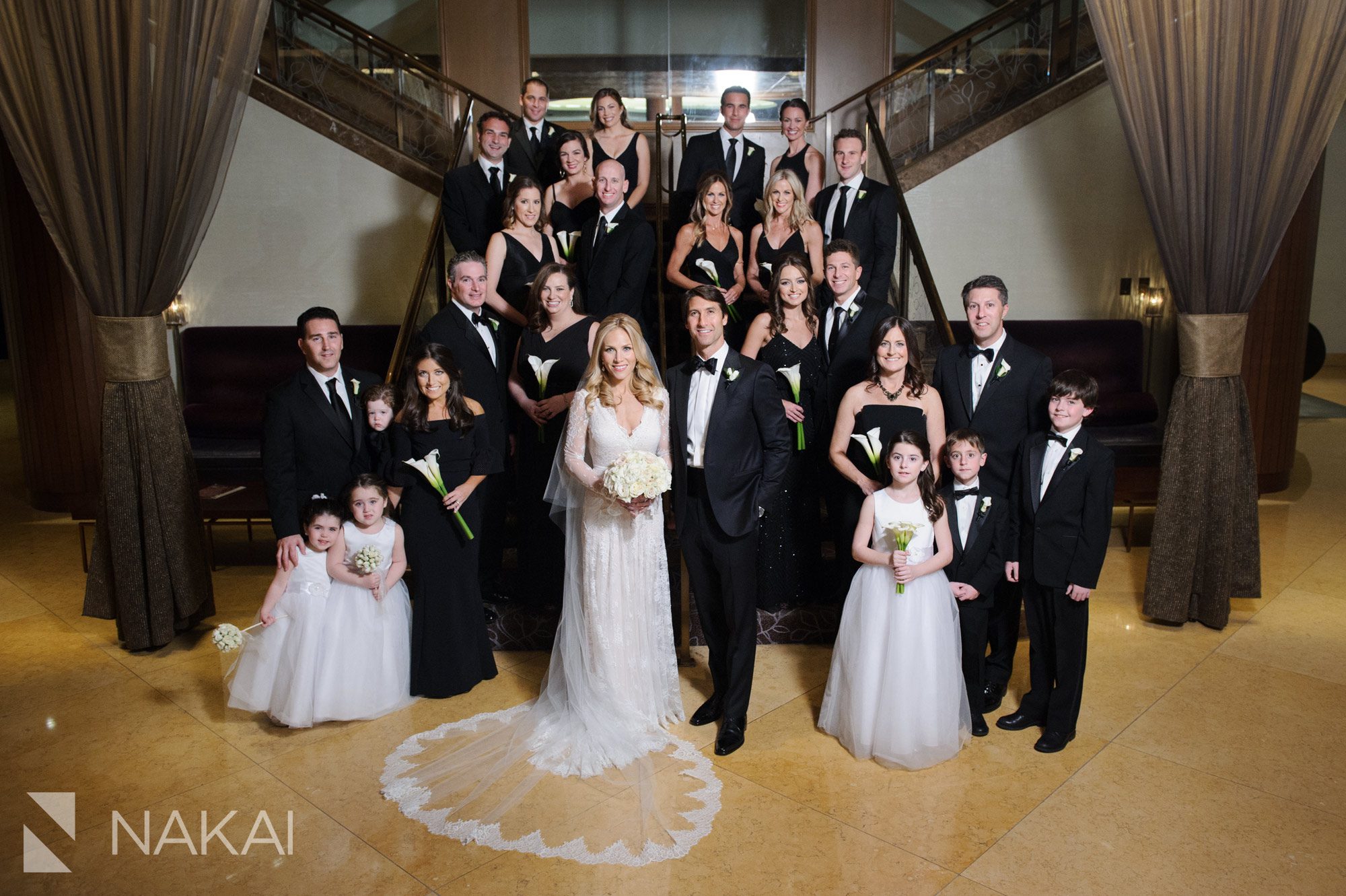 fairmont chicago wedding photo staircase bridal party