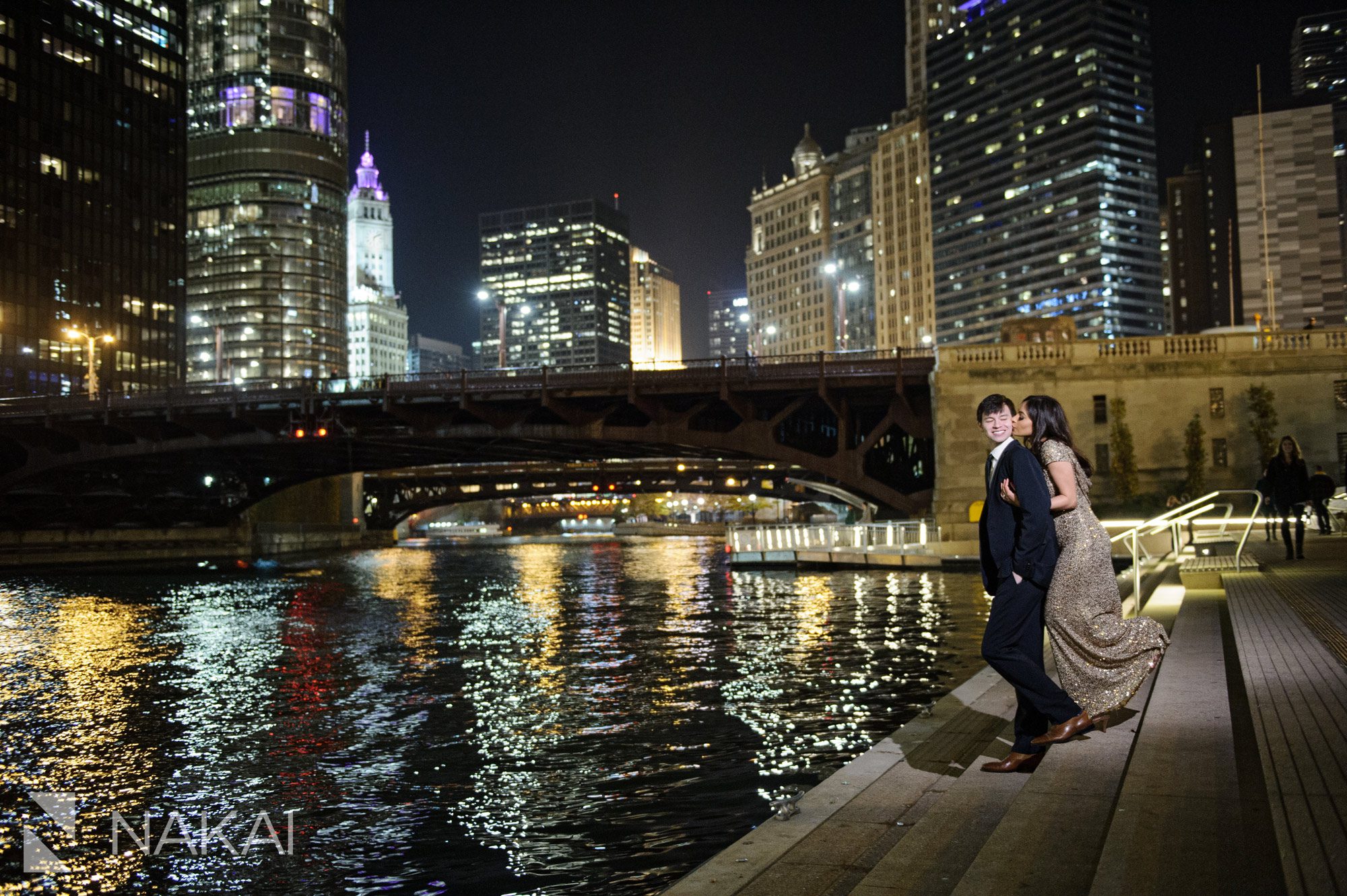 night time chicago engagement photographer riverwalk