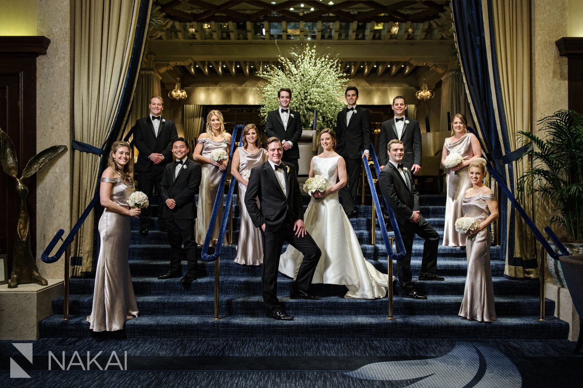 best drake hotel chicago wedding photographer luxury staircase bridal party