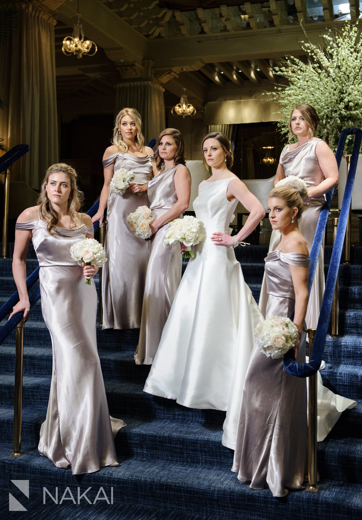 drake hotel chicago wedding photos luxury staircase bridal party