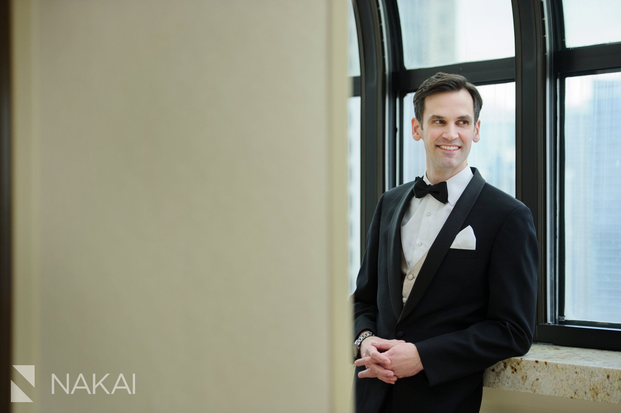 Intercontinental Chicago wedding photos groom getting ready magnificent mile