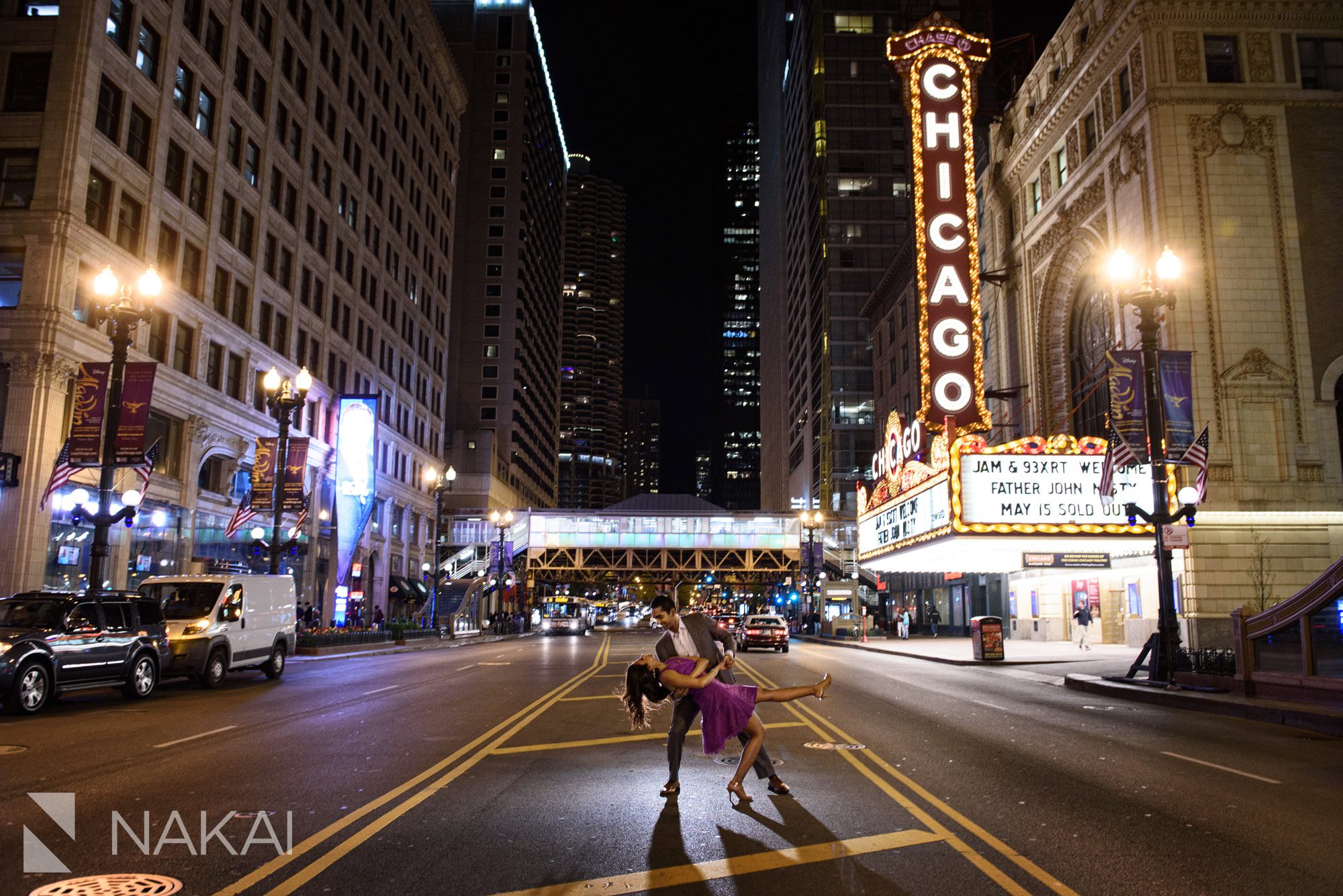 best Chicago engagement spot photographer night theater marquee state street