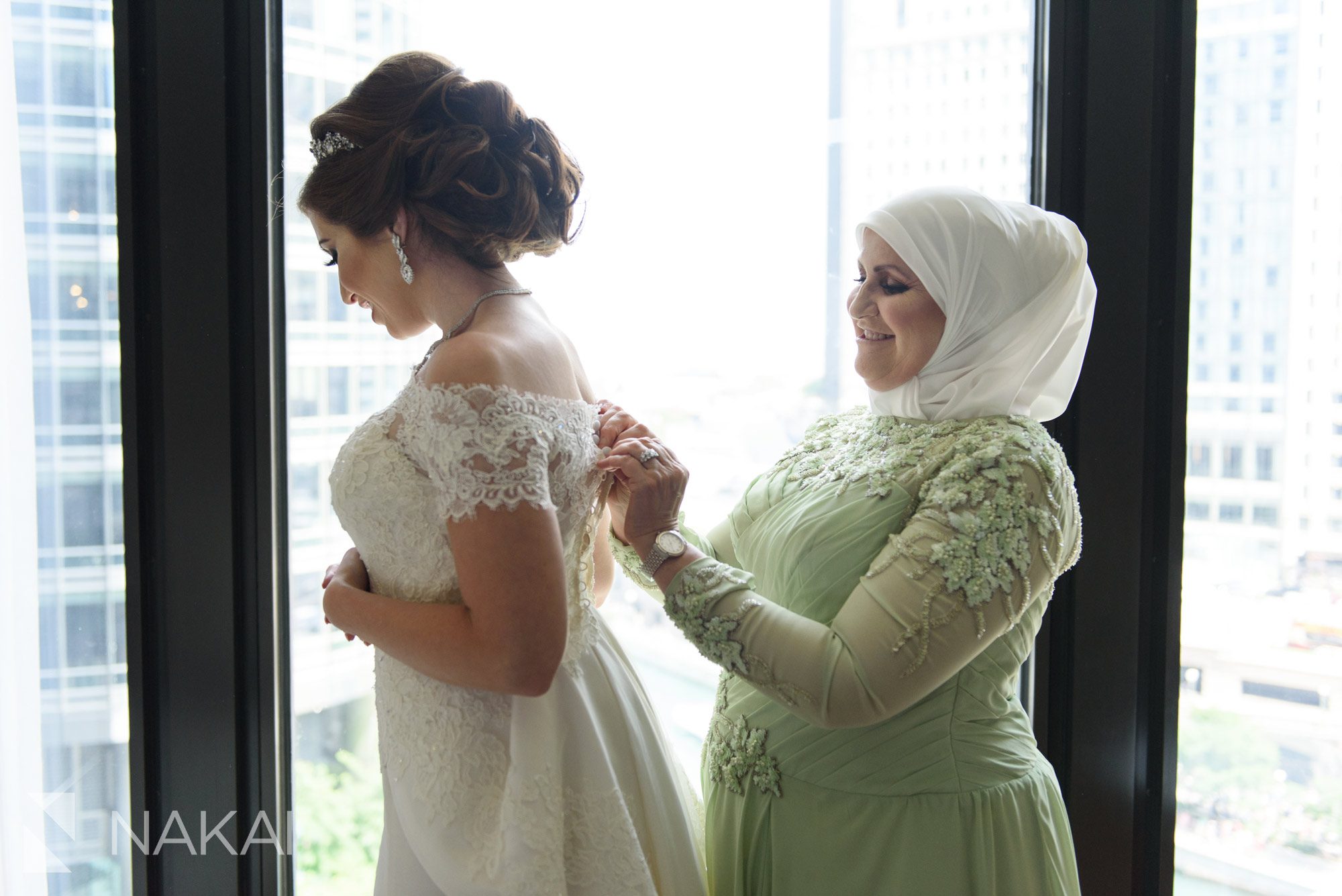 getting ready wedding pictures Chicago Langham
