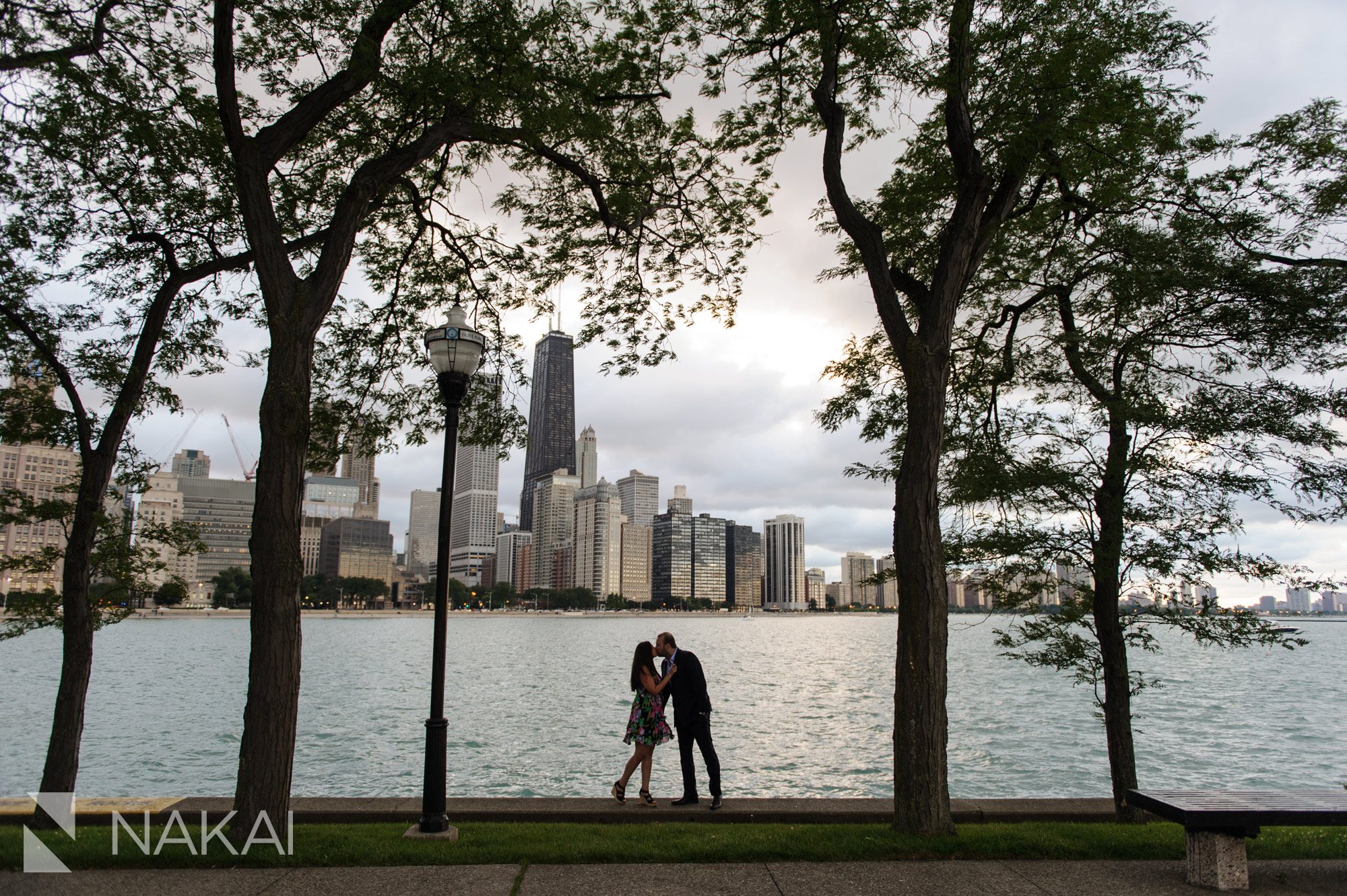 olive park engagement photo Chicago skyline Lake Michigan