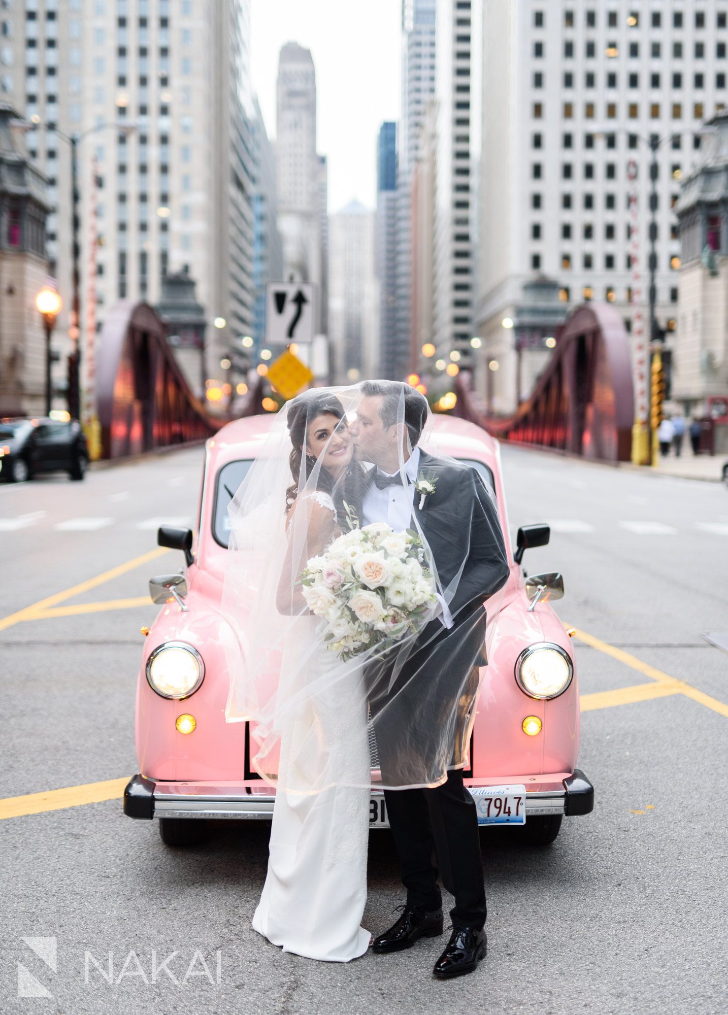 Langham Chicago photographer wedding pink taxi