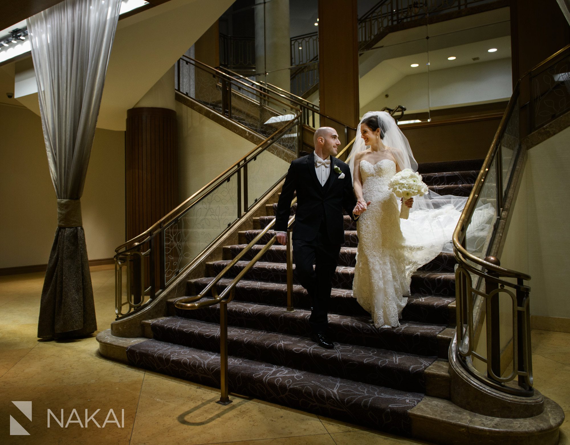 fairmont chicago wedding photo staircase bride groom
