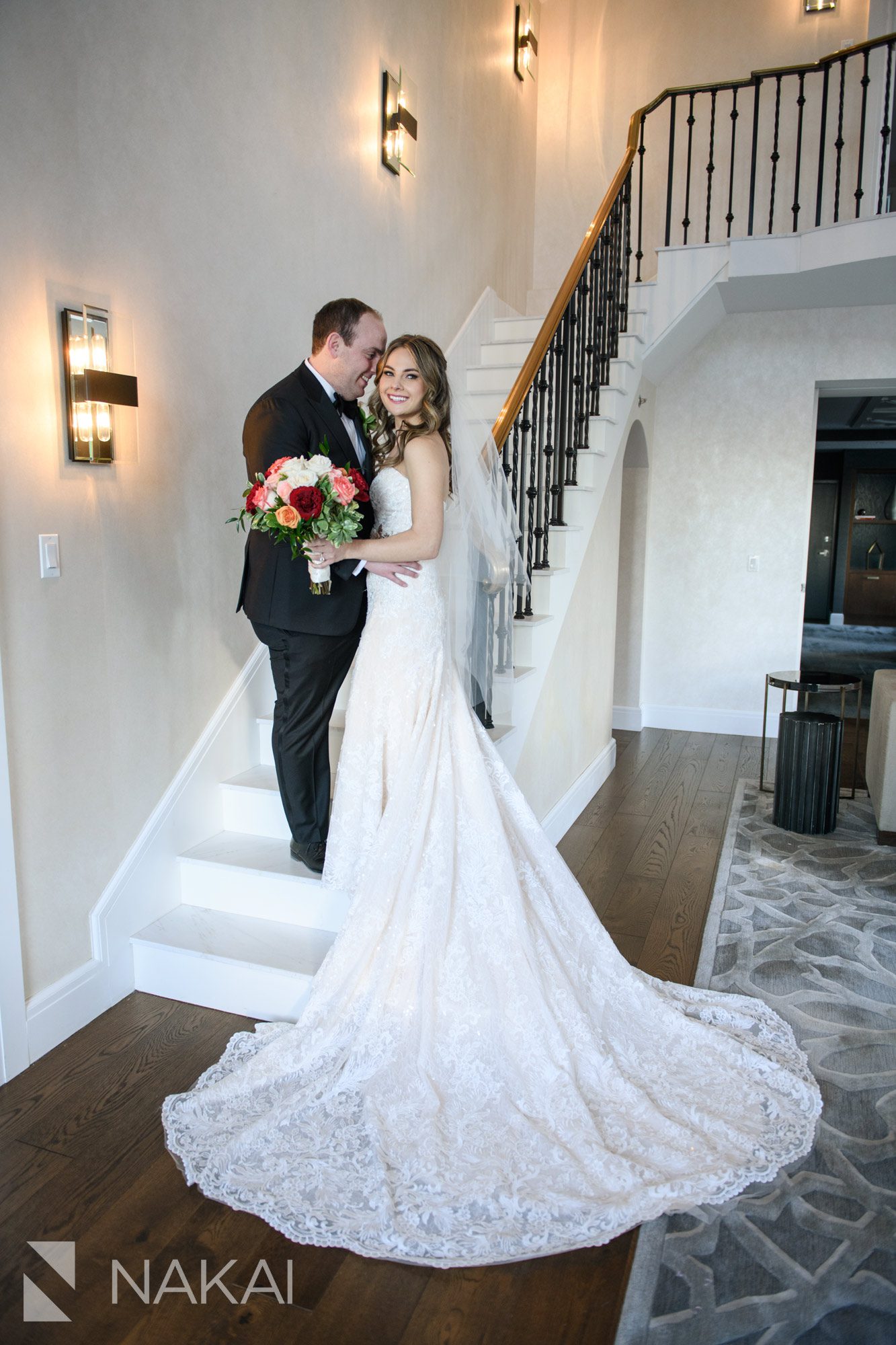 intercontinental chicago magnificent mile wedding photos bride groom staircase