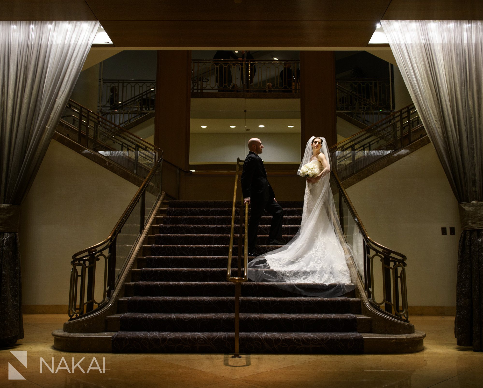 fairmont chicago wedding photographer staircase bride groom