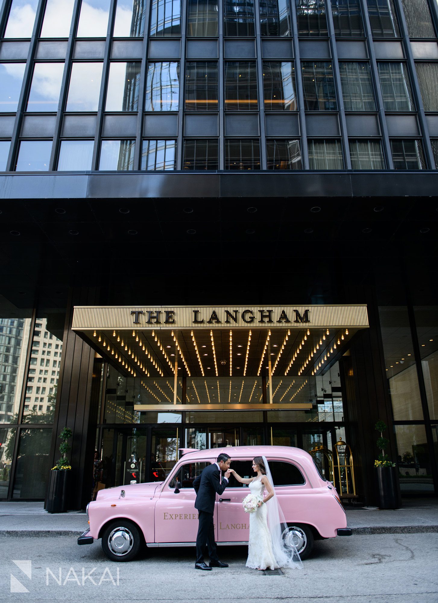 langham Chicago wedding photographer pink taxi bride groom