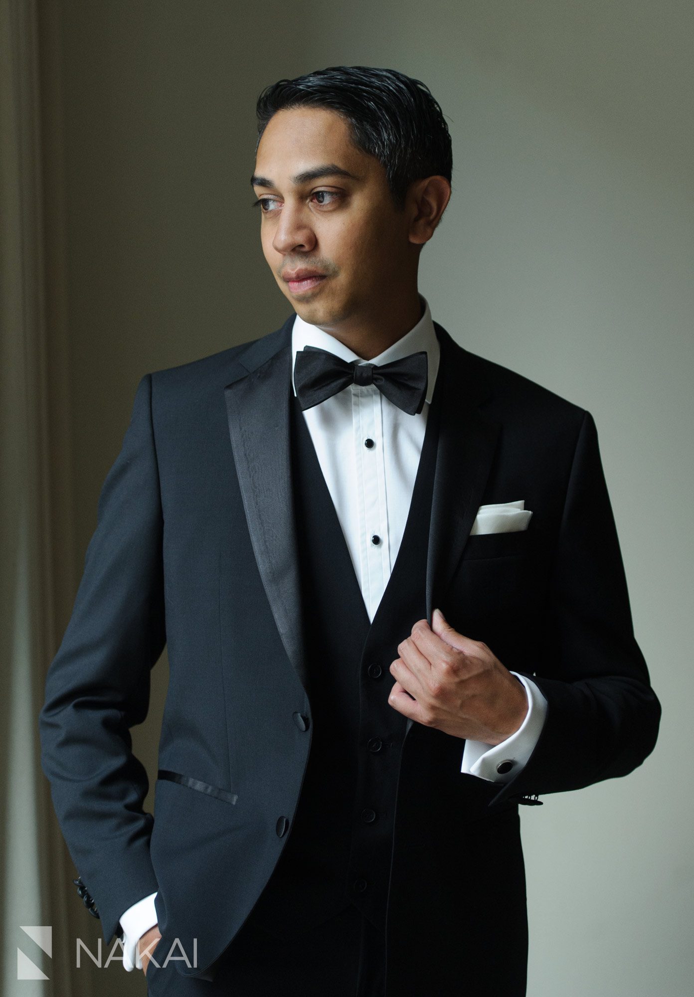 luxury Chicago wedding photographer Langham hotel groom