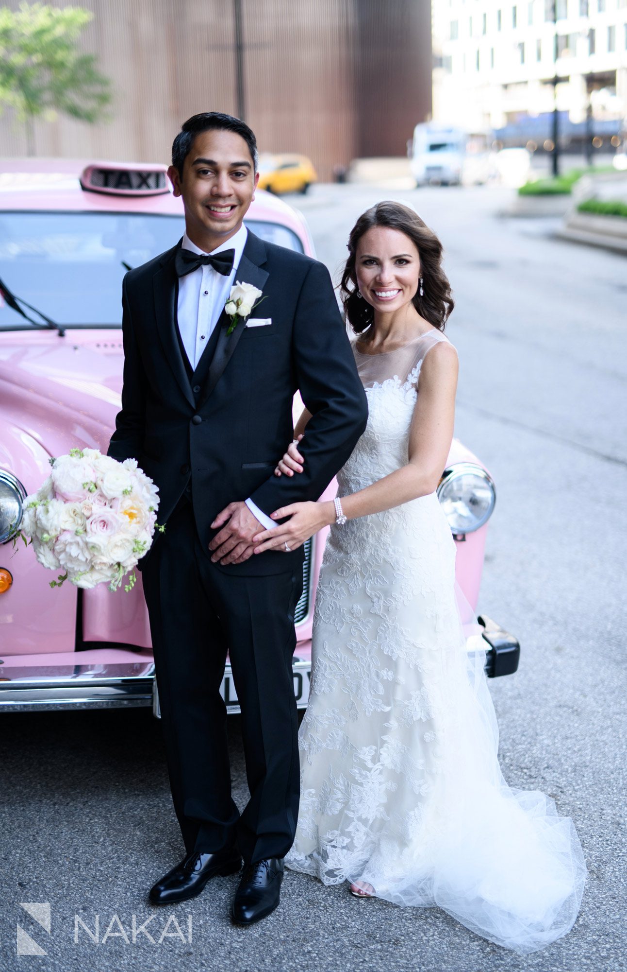 langham Chicago wedding picture pink taxi bride groom