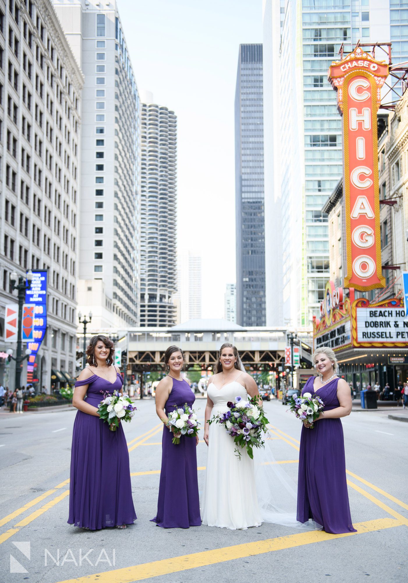 Chicago theatre sign wedding photographer bridal party