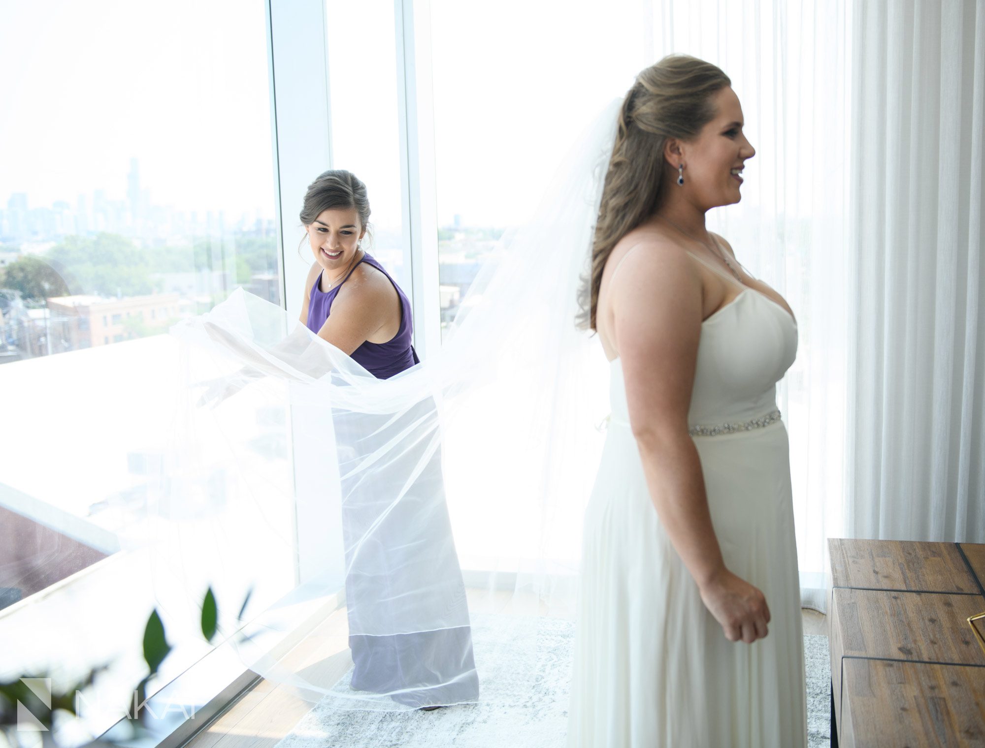 the hotel at midtown Chicago wedding photographer bride getting ready