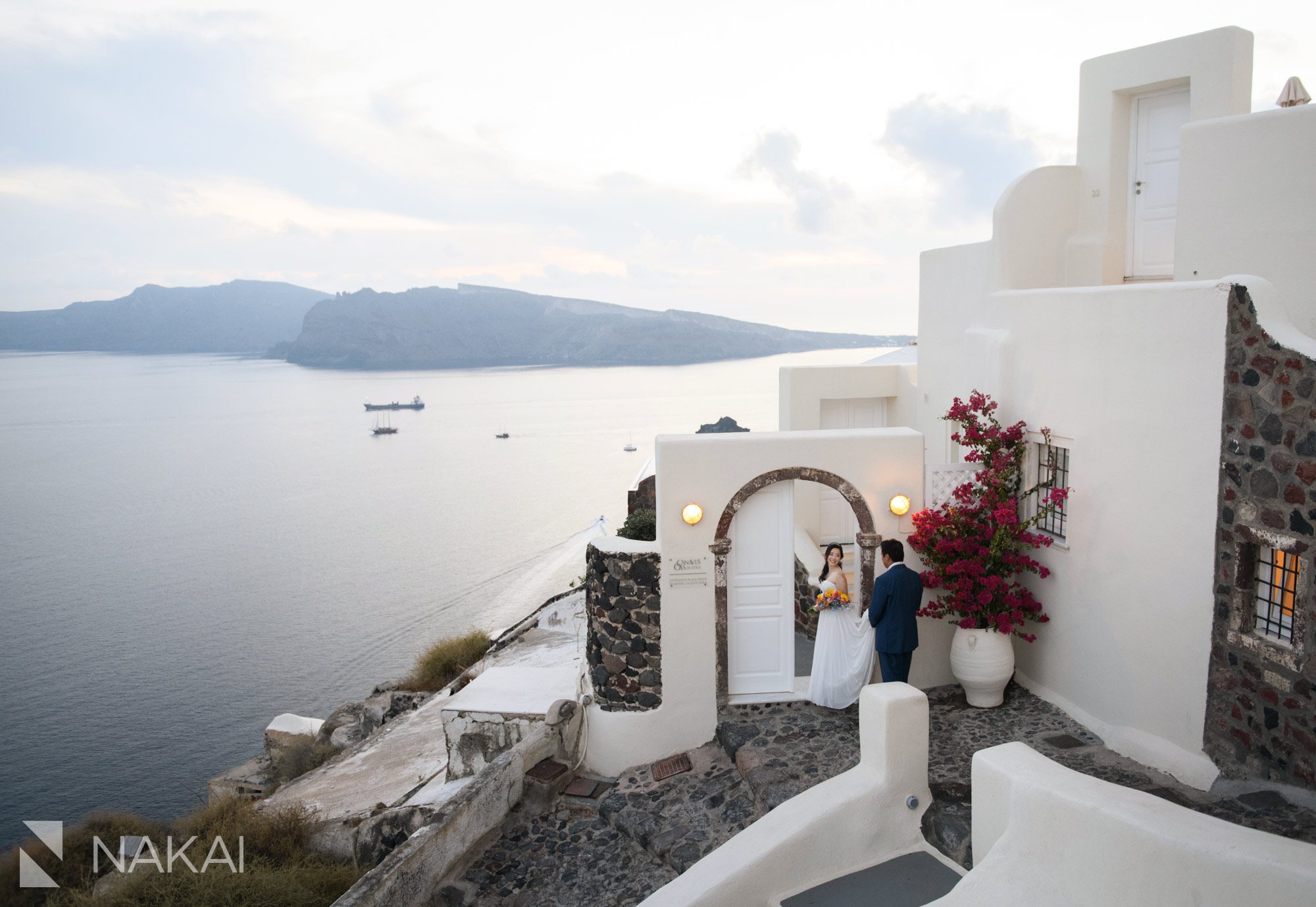 destination wedding photographer canaves suites Oia Santorini Greece bride groom
