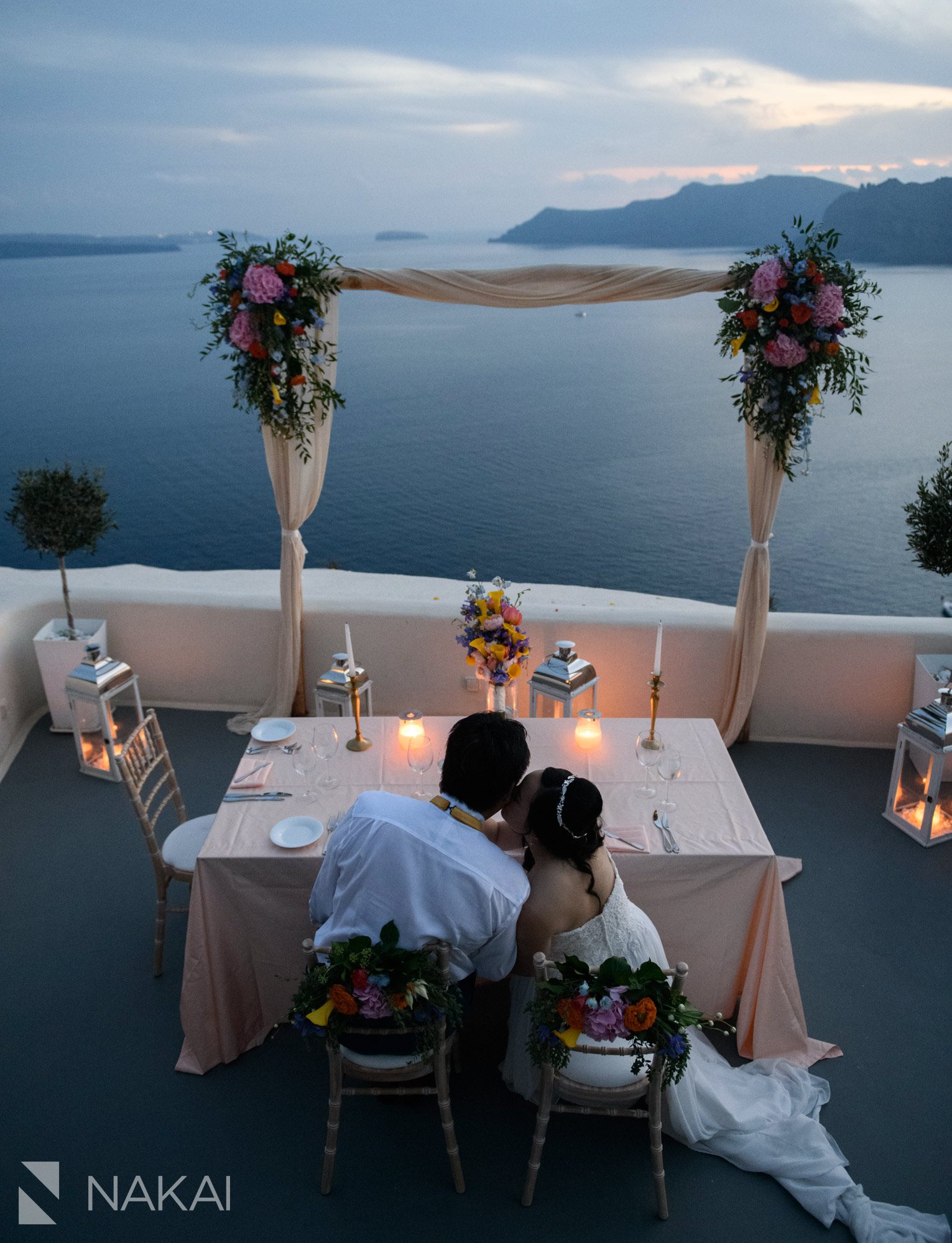 destination wedding photographer canaves suites Oia Santorini Greece reception