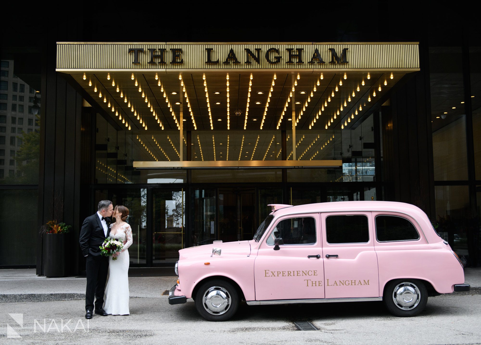 Langham Chicago wedding photos pink taxi
