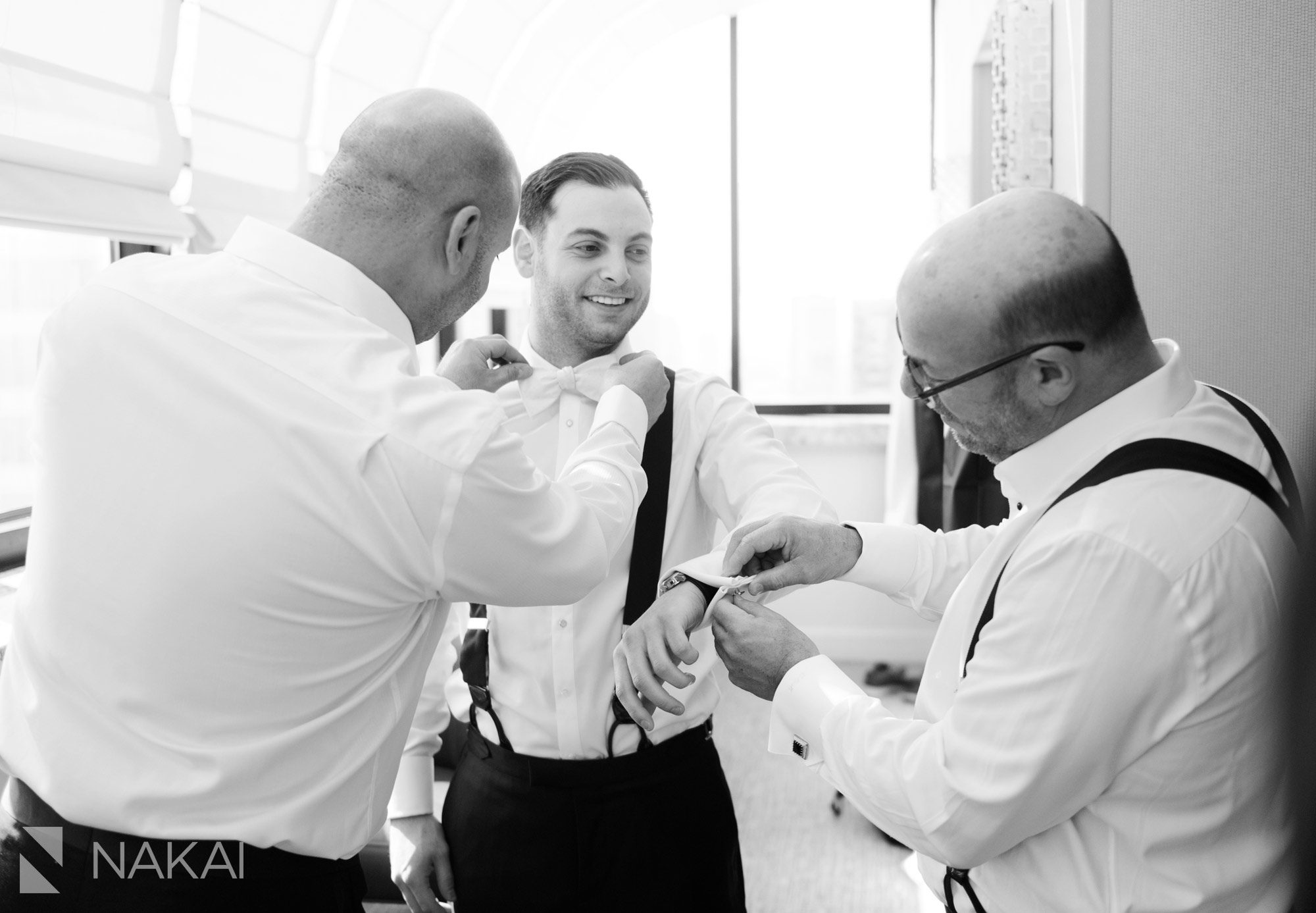 chicago intercontinental magnificent mile wedding pictures groom getting ready