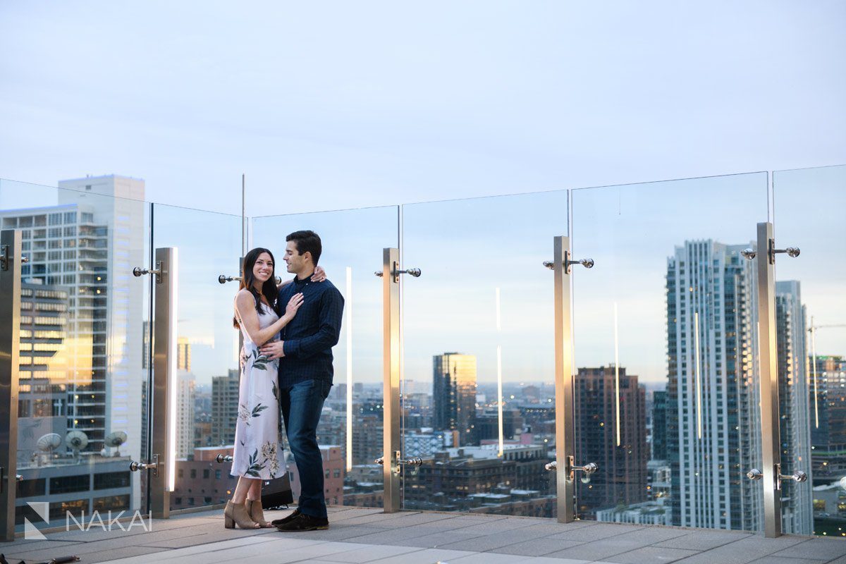 Chicago rooftop engagement couple setting sun