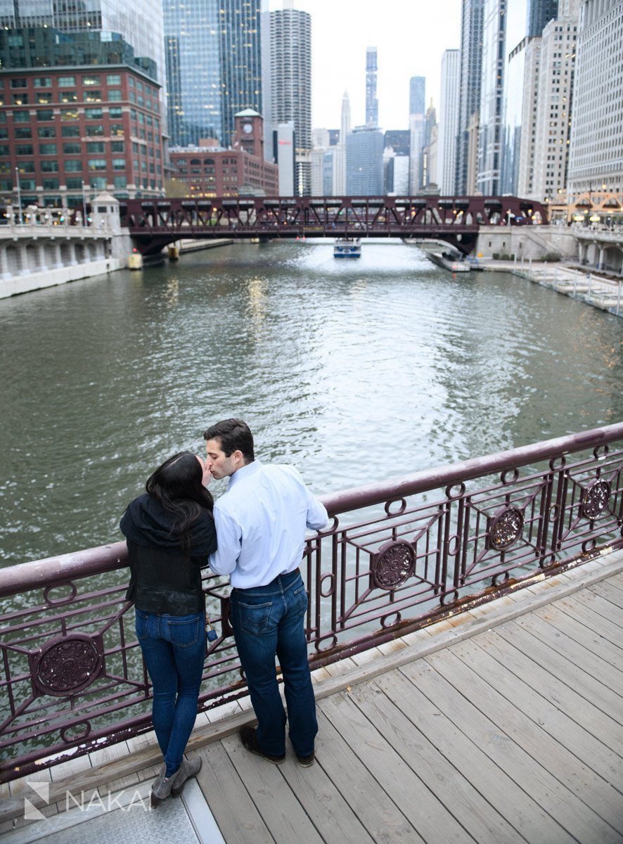 chicago riverwalk engagement photographer kiss 