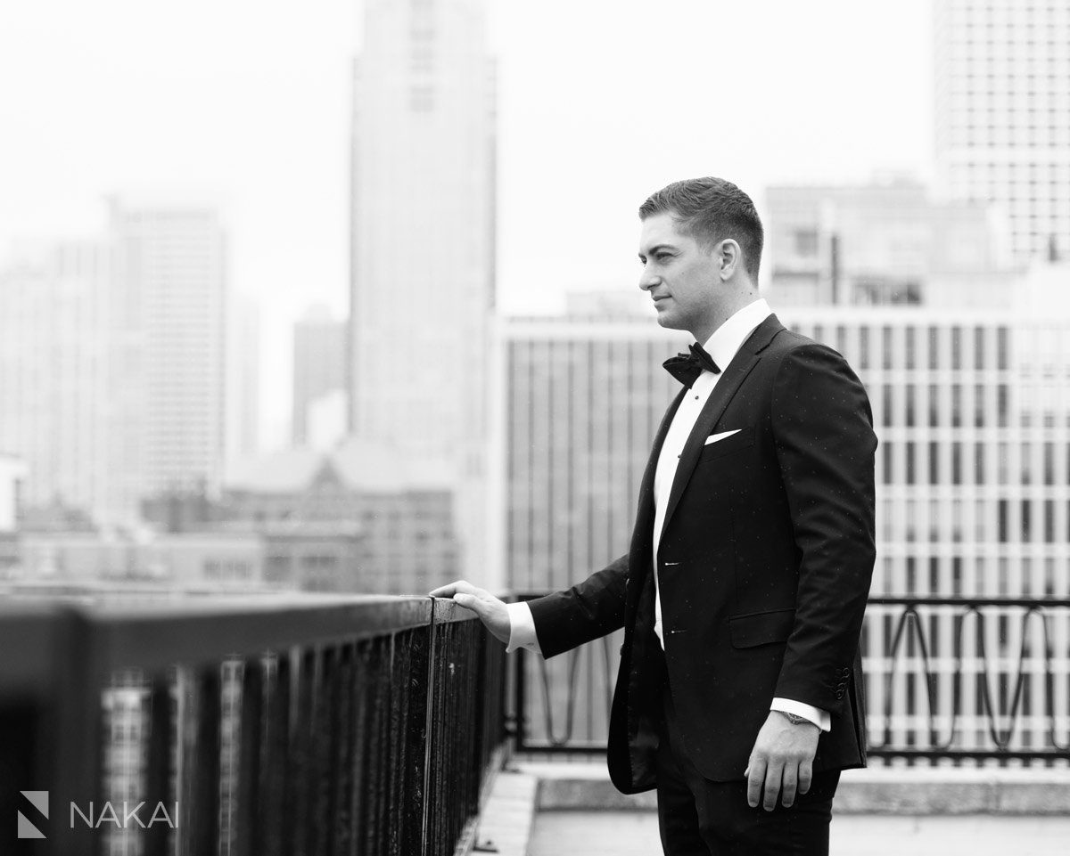 ambassador chicago wedding photo rooftop groom