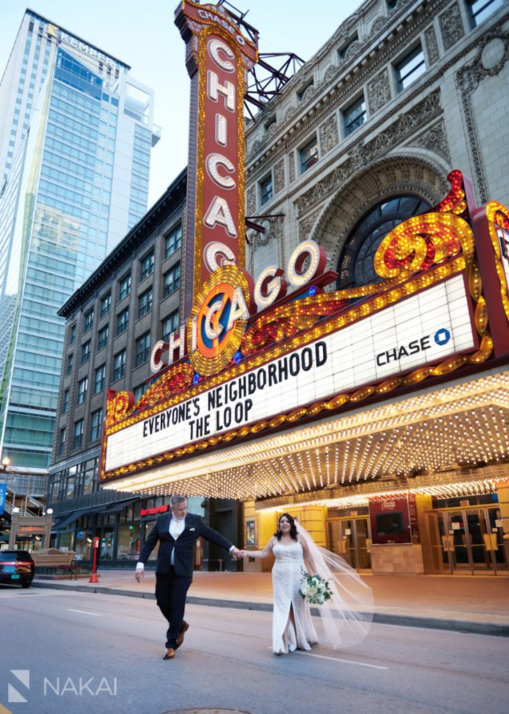 chicago intimate wedding photographer chicago theatre sign