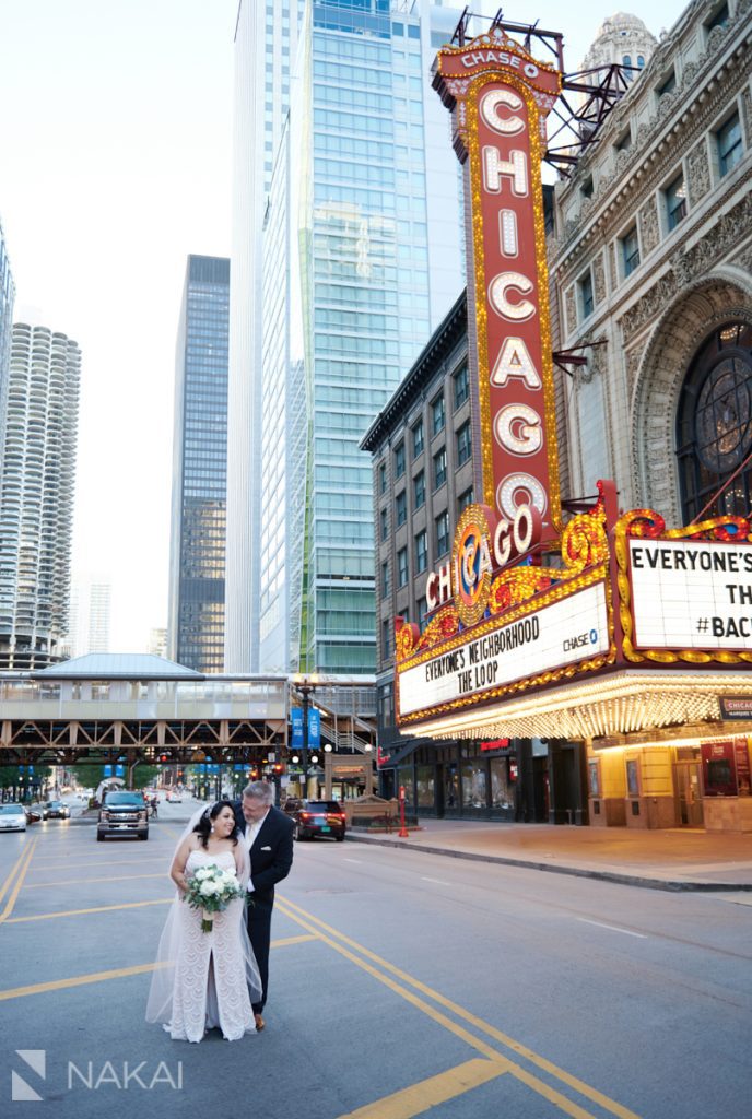 chicago intimate wedding photos chicago theatre sign