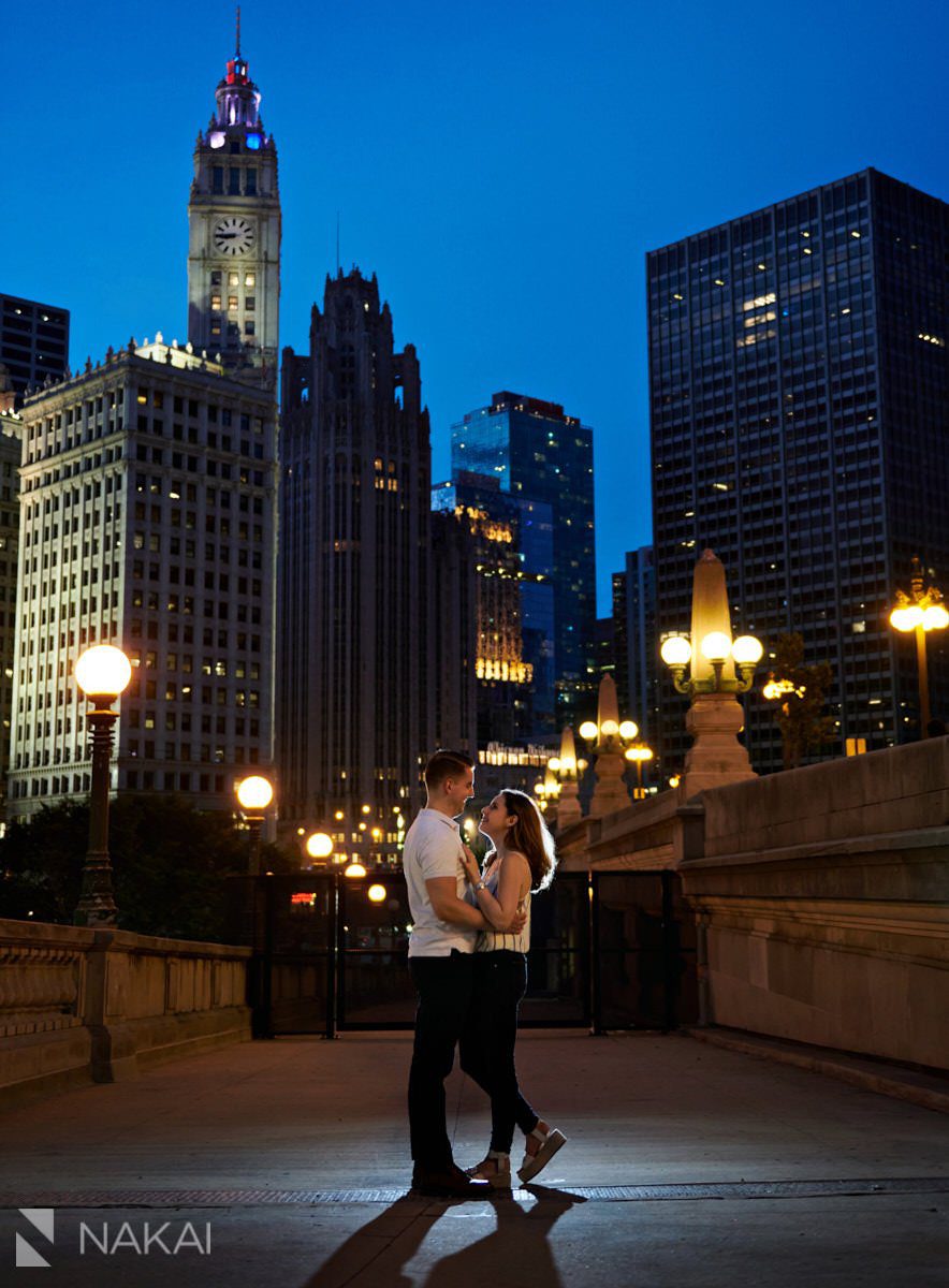 chicago riverwalk engagement photos at night Wrigley building