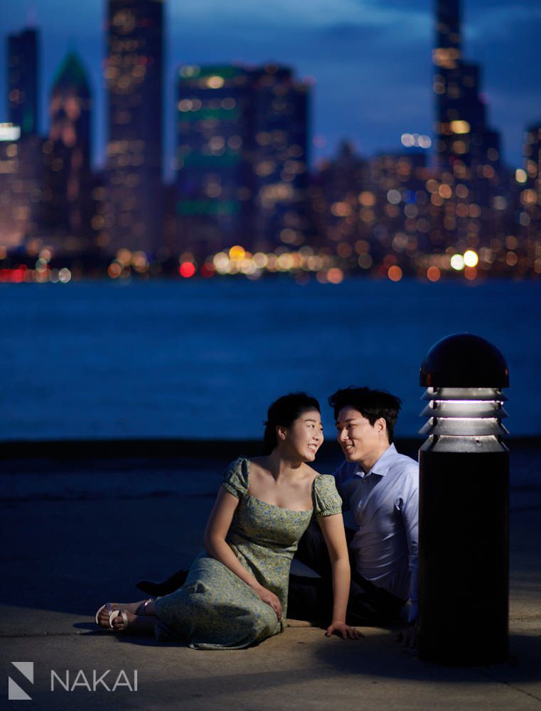 Chicago skyline engagement photo couple at night Adler planetarium