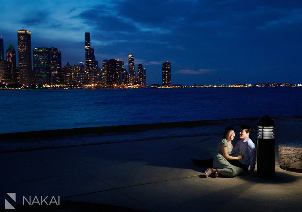 Chicago skyline engagement pictures couple at night Adler planetarium