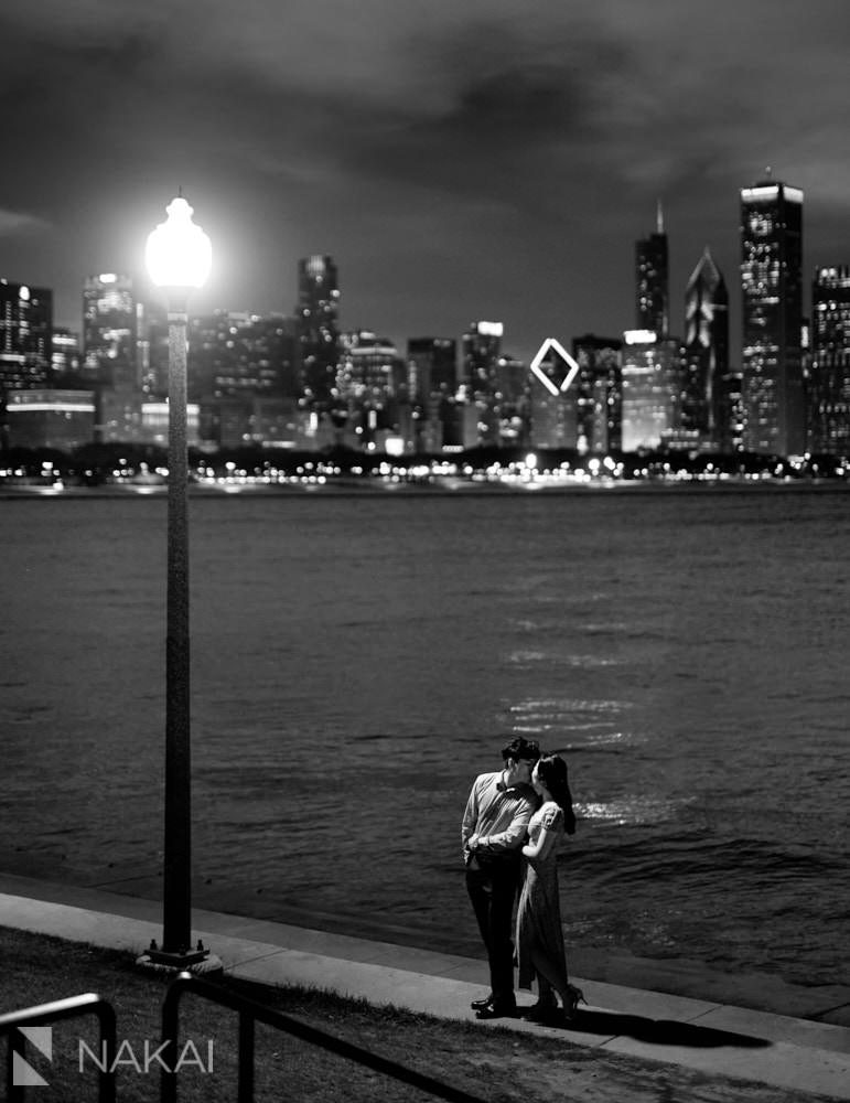 Chicago skyline engagement picture couple at night Adler planetarium