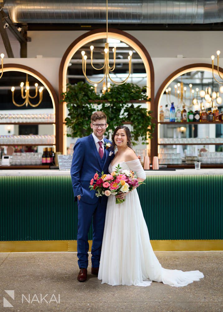 the tinsmith wedding photos bar indoors