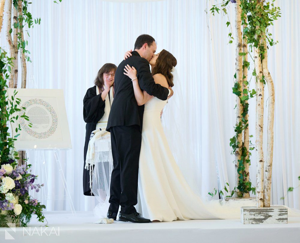 twin orchard Country Club wedding photos ceremony kiss