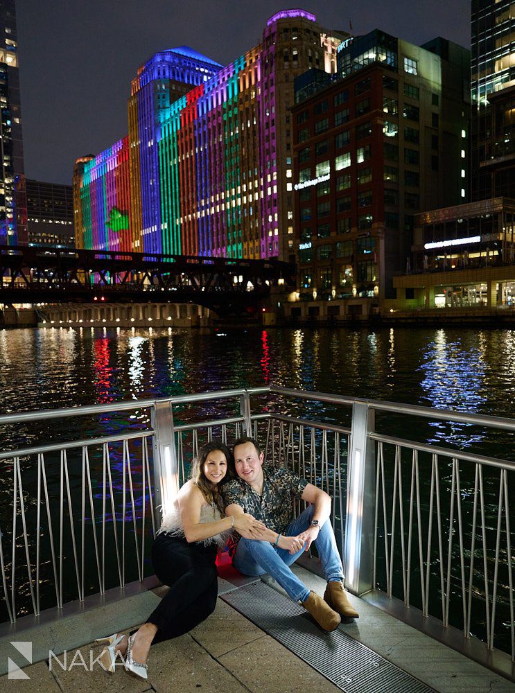 engagement photos in chicago night time riverwalk