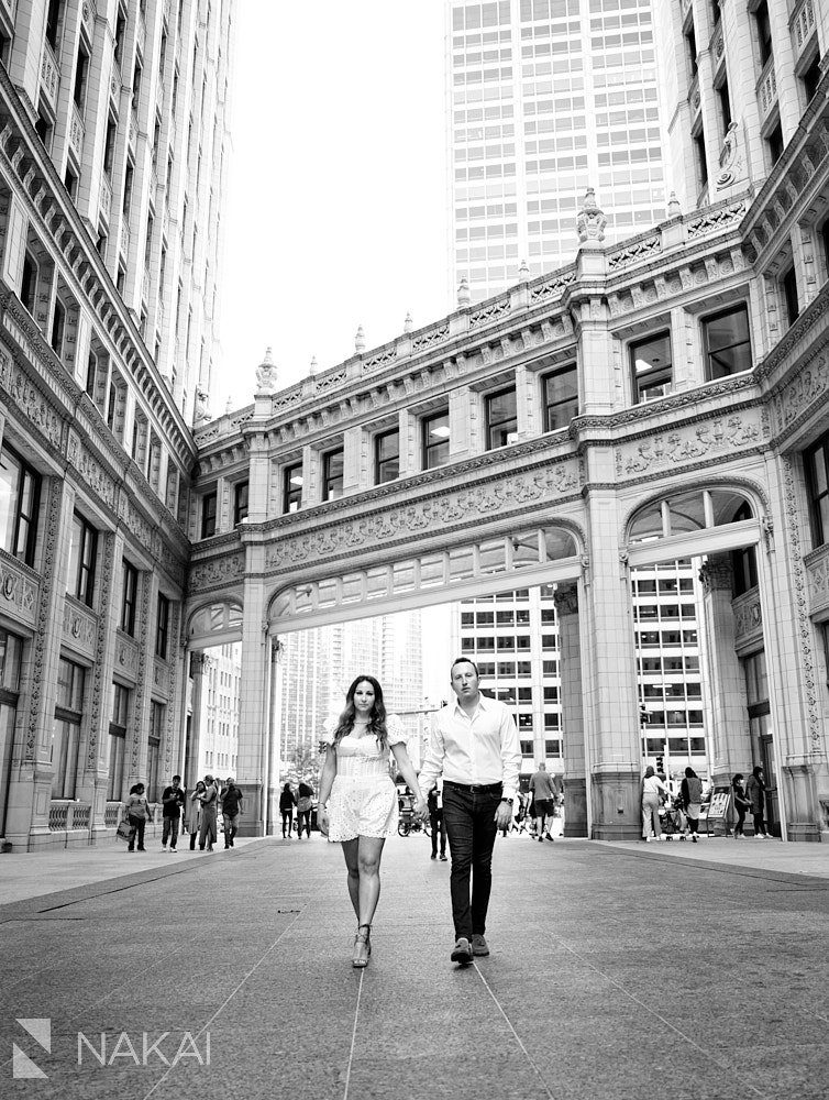 engagement photos in chicago Wrigley building black white