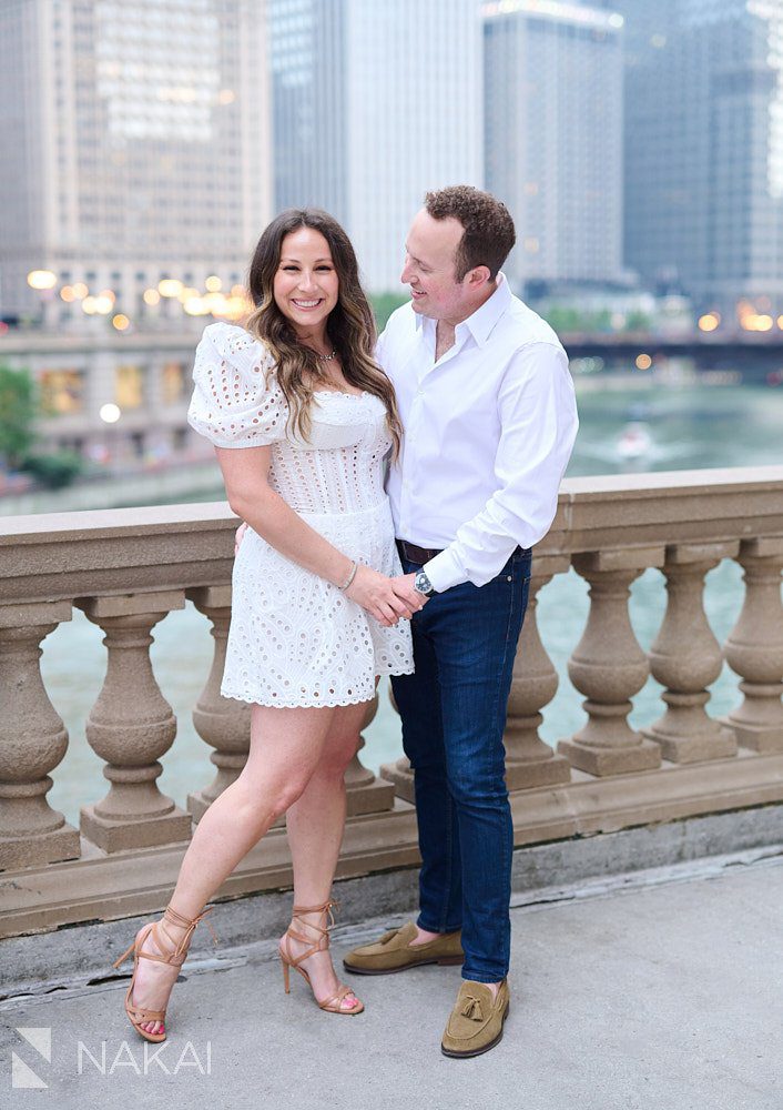 engagement photos in chicago Wrigley building river