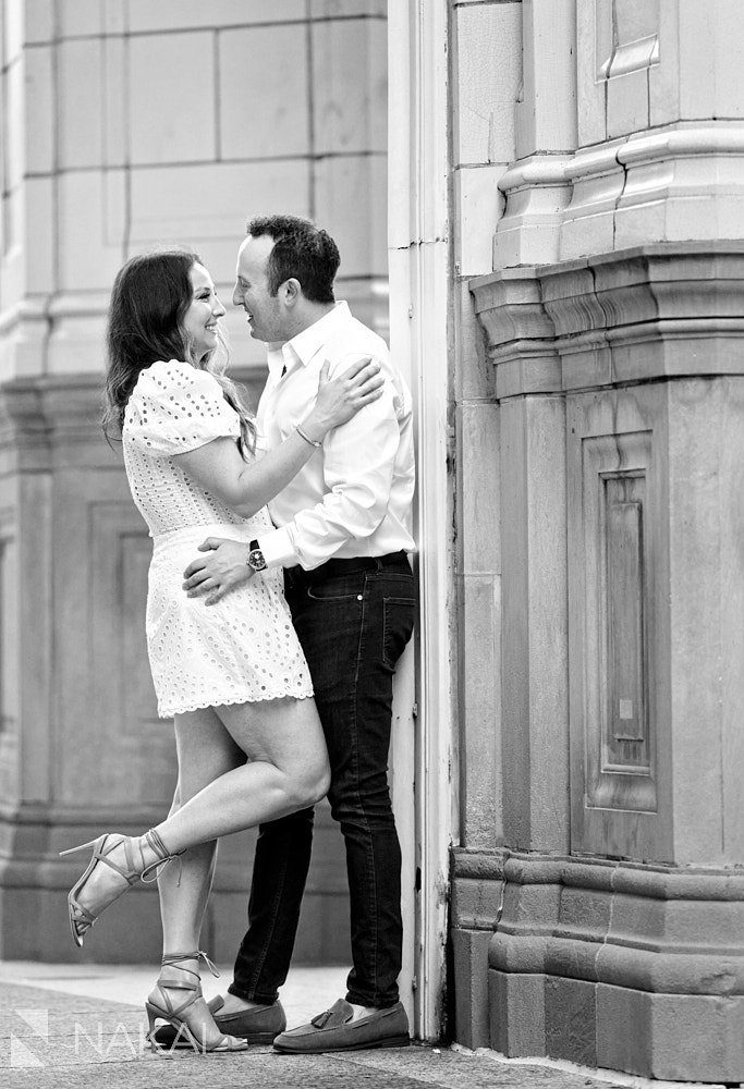 engagement photos in chicago Wrigley building black white