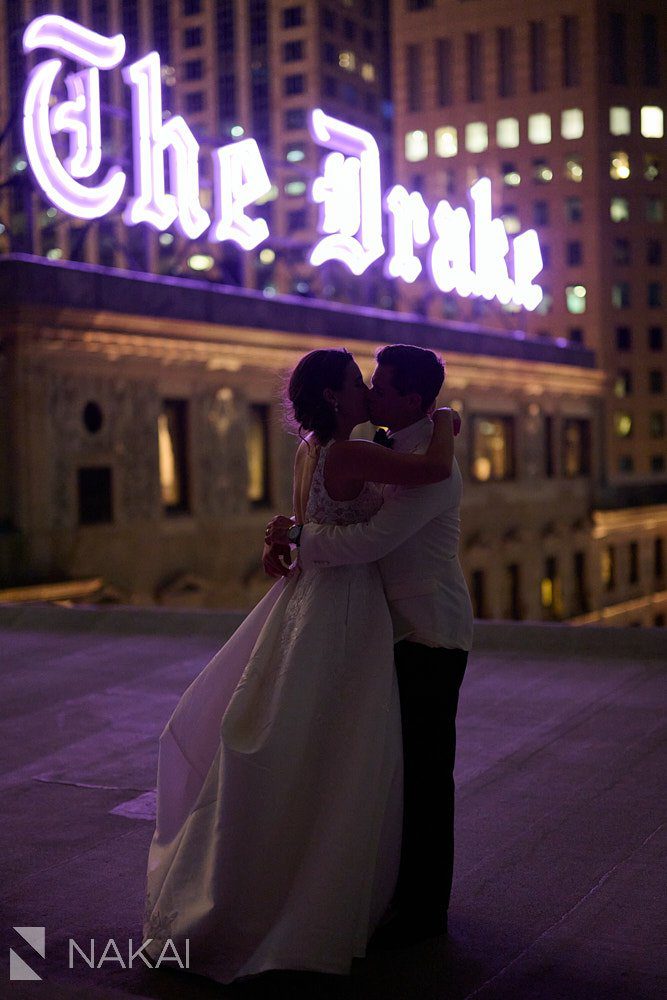 the drake wedding photos rooftop night time