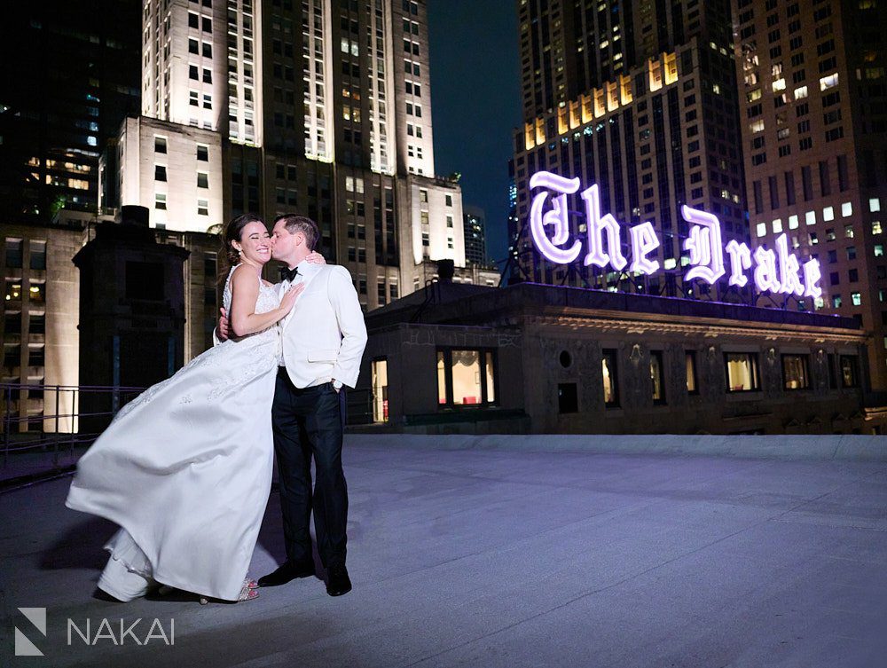 the drake wedding photos rooftop night time