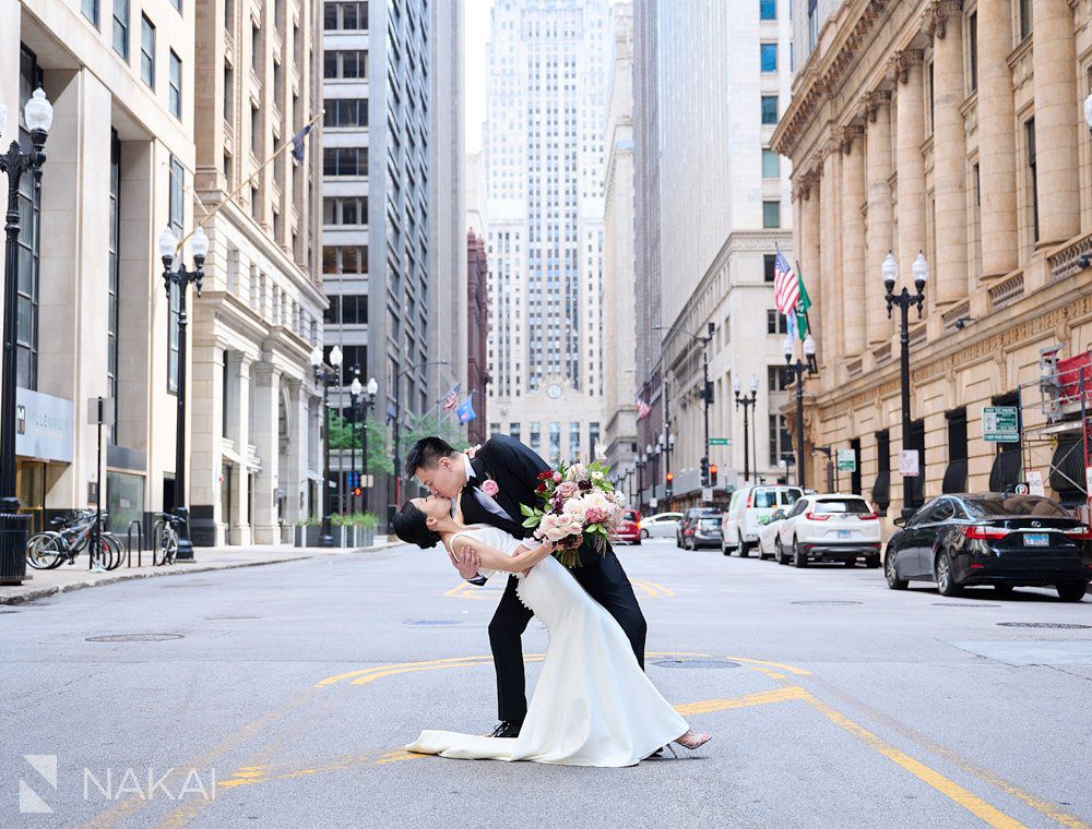 Chicago board of trade wedding photos Lasalle street bride groom
