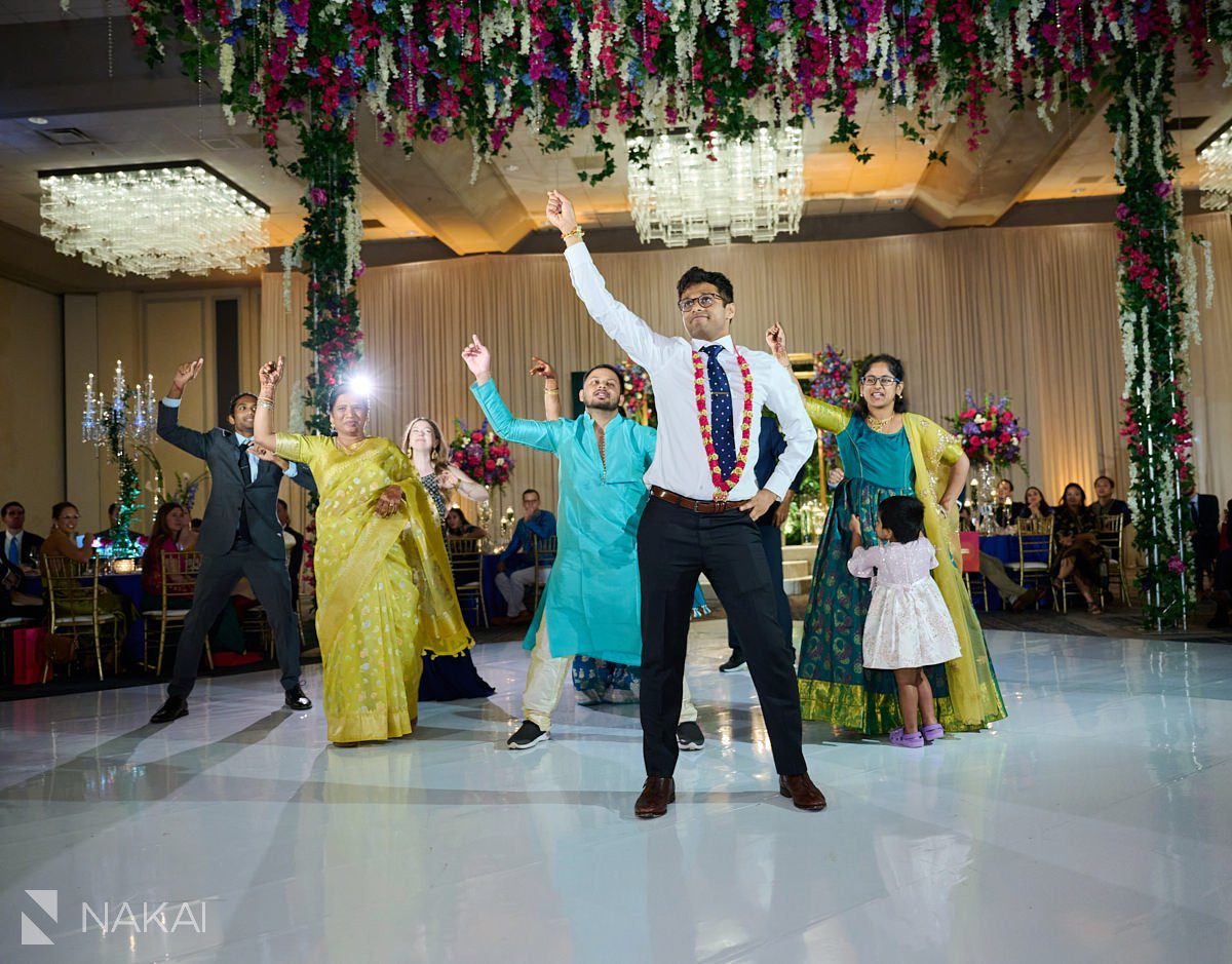 chicago Indian wedding photos reception performance groom dance