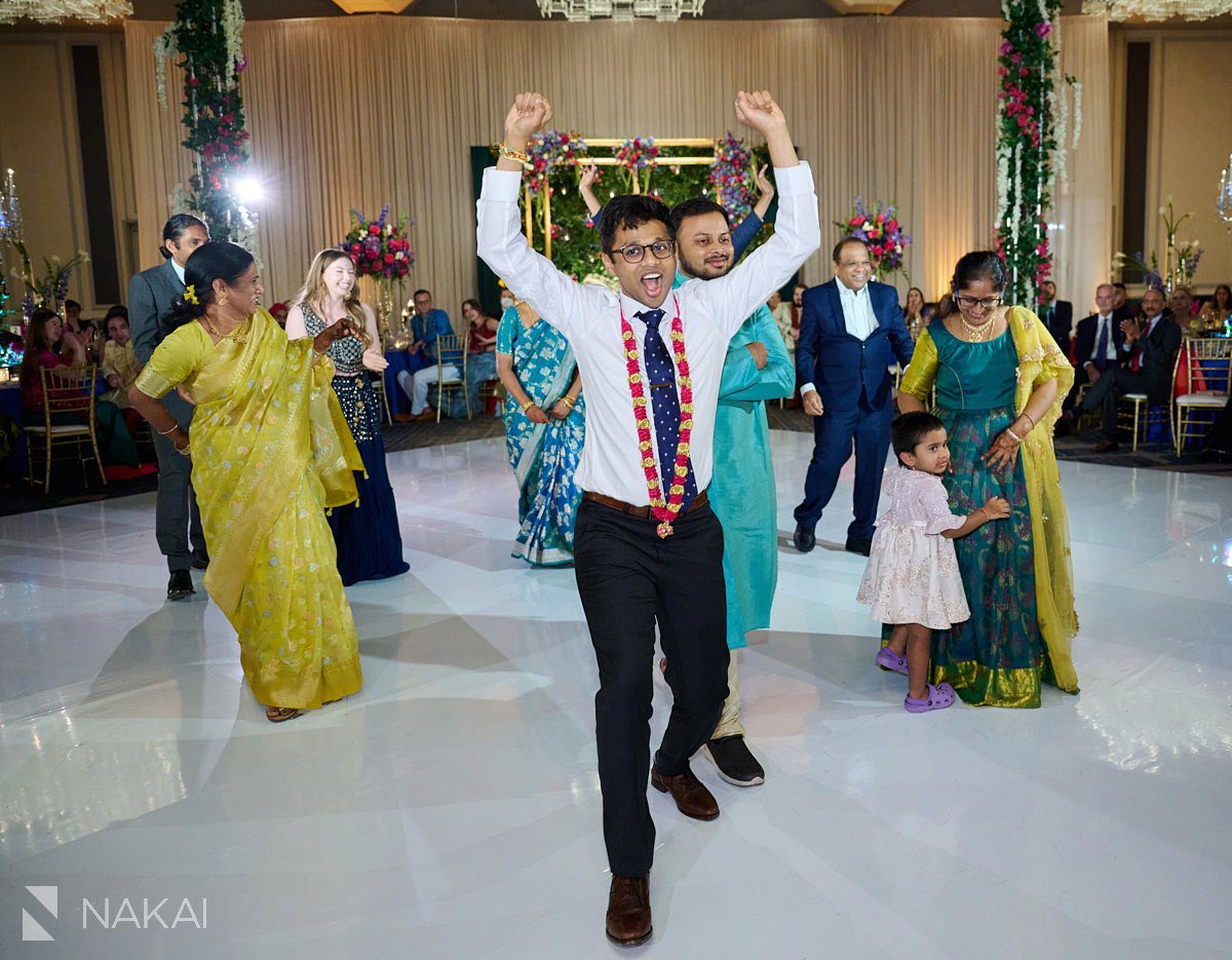 chicago Indian wedding photos reception performance groom dance